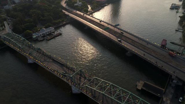 BANGKOK THAILAND - 2018 may 25 ,Aerial view of Bangkok downtown,Traffic at the Phra Phuttha Yodfa Bridge and Phra Pok Klao Bridge ,Chao Phraya River In the morning.