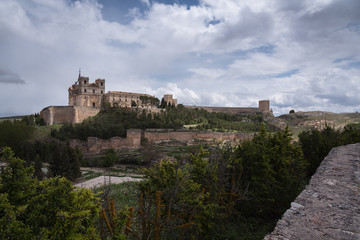 Fototapeta na wymiar Vista panorámica del Monasterio, el Castillo y las murallas de Uclés (Cuenca), España