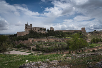 Fototapeta na wymiar Vista panorámica del Monasterio, el Castillo y las murallas de Uclés (Cuenca), España