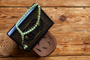 Muslims holy book Koran. Translation: The Holy Quran