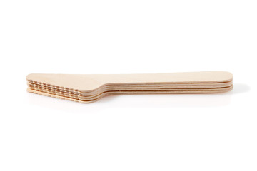 Eco-friendly materials. Wooden, disposable tableware on a white background.
