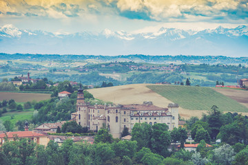 Fototapeta na wymiar Castle of Costigliole d'Asti (Piedmont - Italy). Sunset light vintage colors