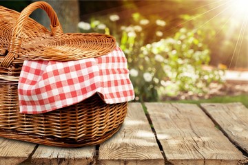 Picnic Basket with napkin om nature background