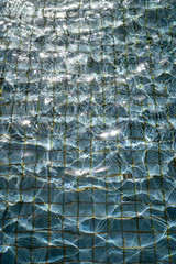 Water in Swimming Pool Texture Background