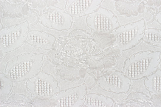 Close up of a white fabrics with floral pattern