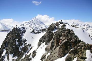 Fototapeta na wymiar alpinism in the snowy mountains