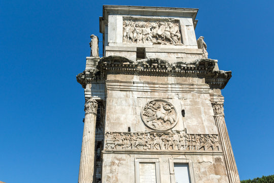 Ancient Arch of Constantine near Colosseum in city of Rome, Italy