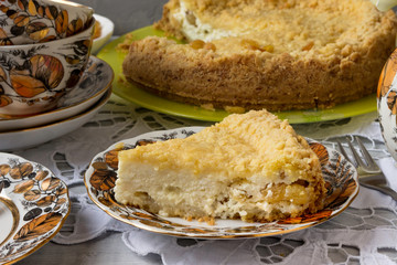 A piece of pie with cottage cheese.