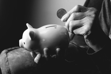 grandmother and piggy bank