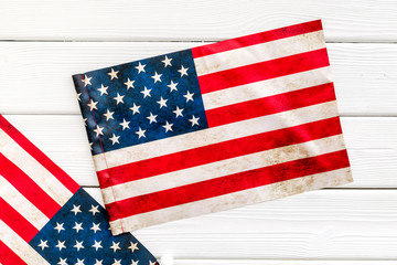 Memoral day of United States of America with flag on white wooden background top view