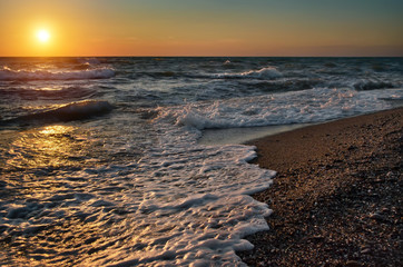 Fototapeta na wymiar Golden sunset over the Black Sea coast, Ukraine.