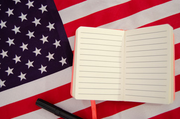 Usa flag with notebook, diary , copy space