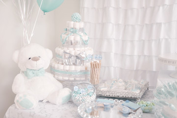 Decoration. Cute diaper cake for a baby shower party