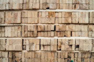 Close up on stack of rough sawn timber pine lumber construction material at the building site © Miljan Živković