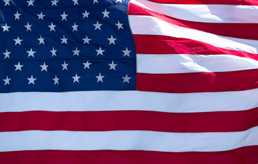 Obraz premium Extreme Close Up of the Stars and Stripes of an American Flag