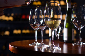 Set of 3 glasses with different types of wine in cellar