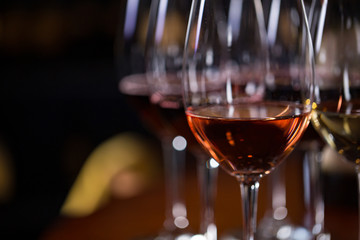 Set of 3 glasses with different types of wine in cellar