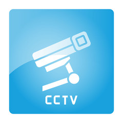 CCTV sign in blue signage