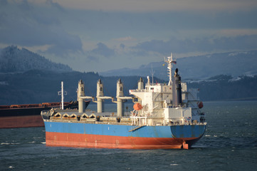 ship at anchor in the east mooring basin of the Columbia river in Astoria, Oregon