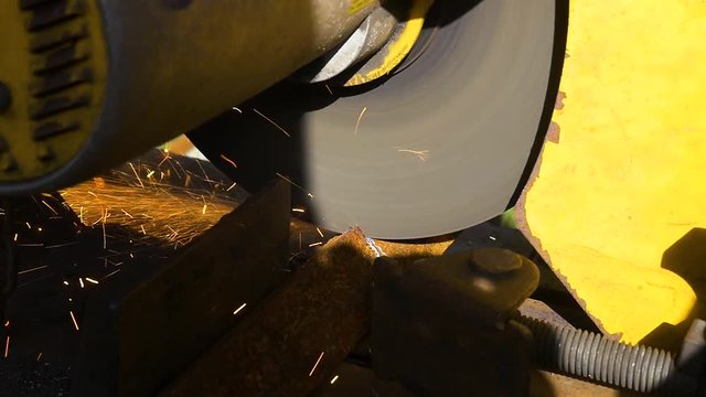 abrasive shop saw cutting angle for a fabrication shop's project; table legs. 
 carbide blade and sparks and what define this tool