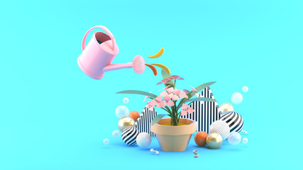 The shower watered down the flowers among the colorful balls on the blue background.-3d rendering.