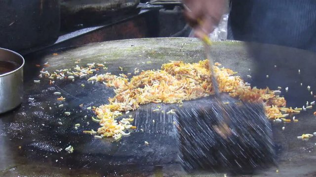Video/footage of Chiken Biryani making on Tava.Famous dish of Ramadan/Ramzan and served in iftar.