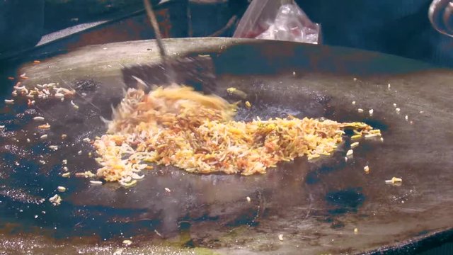 Video/footage of Chiken Biryani making on Tava.Famous dish of Ramadan/Ramzan and served in iftar.