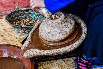 Argan oil extraction by traditional stone handmill mill