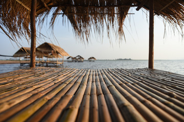Bamboo hut,The place is made of bamboo and the backdrop is the sea, the sky, the sunshine.