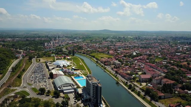 View of the city of Oradea from above, showcasing the aqua park and crisul repede river.