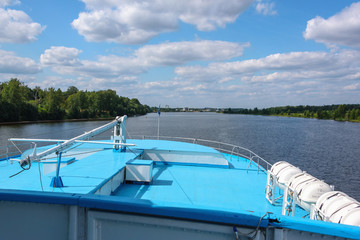 Fototapeta na wymiar View from the captain's place on the river ship. Summer cruise on the river. Relaxation.