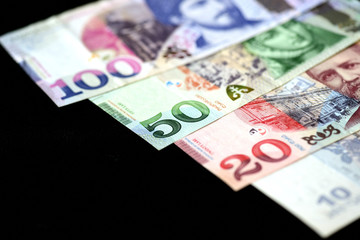 Georgian lari banknotes on a dark background close up