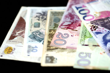 Georgian lari banknotes on a dark background close up