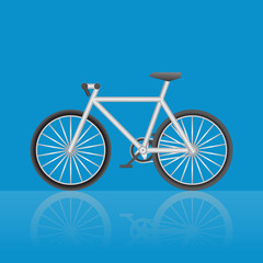 Fototapeta premium Silver metal bike on a blue background
