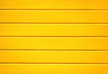 Empty bright yellow background for design, wood texture. Rustic old wooden boards wall shabby yellow color background. Wood Surface fence, Plank texture. template for design. Copy Space.