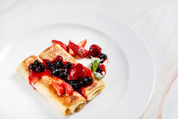 crepes with strawberry and cottage cheese