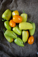 Green pepper and yellow tomato