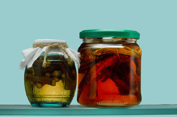 Glass jars with various tinctures in isolate