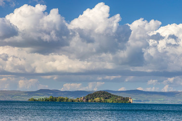 Fototapeta premium Little island at Bolsena lake near Capodimonte, Italy.