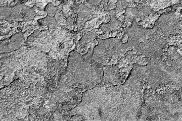 Concrete wall with stains and cracks