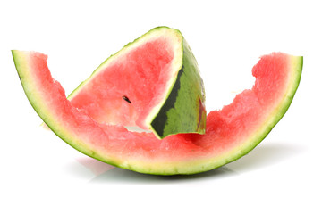 Watermelon slice eaten, isolated over white background