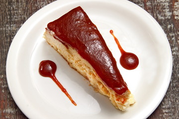 Brazilian coconut candy (Cocada) with guava syrup