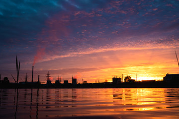 Thermal power plant at sunset