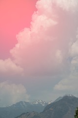 Light rays and other atmospheric dramatic effect , Romantic sky background and texture beautiful fluffy pink clouds.