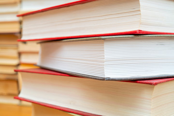 Stack of books in the library. Symbol of knowledge and learning.