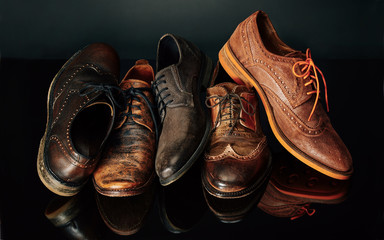 Men's Oxford and Derby Shoes on Black Background