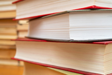 Stack of books in the library. Symbol of knowledge and learning.