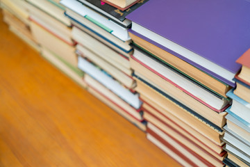 Rows of books in the library. Background for text. Symbol of knowledge and learning.