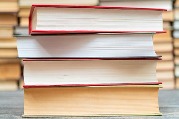 Stack of books in the library. Symbol of knowledge and learning.
