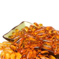 Vitamin Omega-3 fish oil capsules on white background 